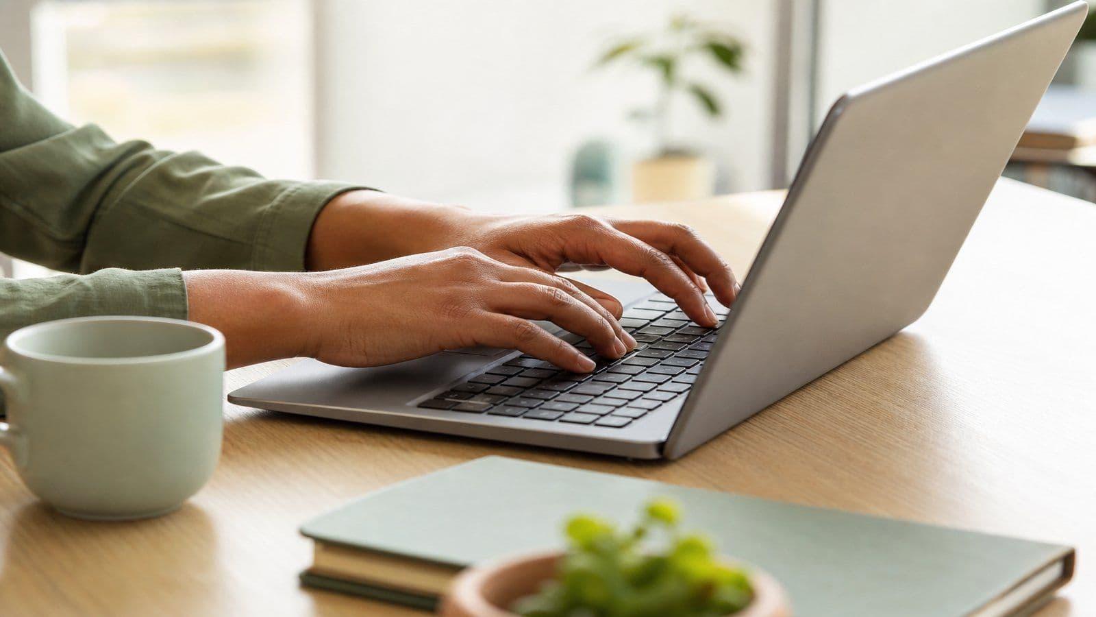A bookkeeper carefully keys in starting account balances